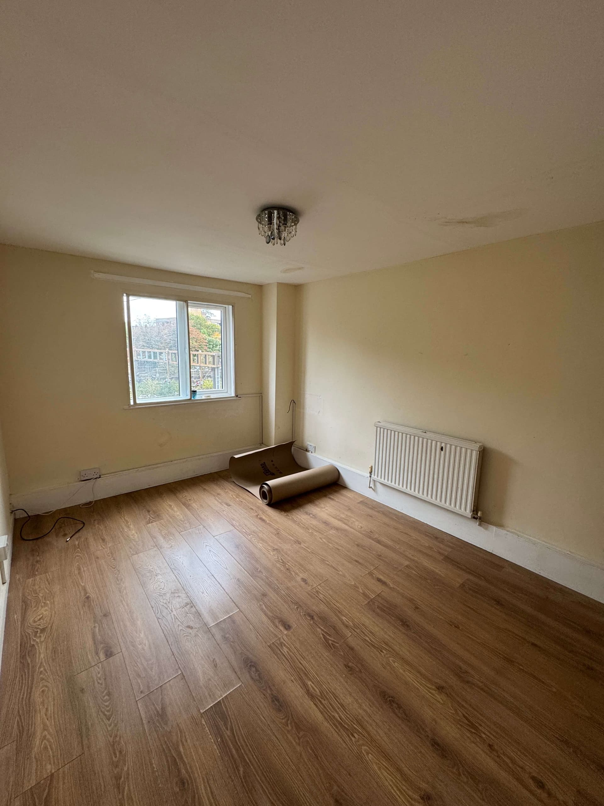 Prime Coat decorator spraying joinery panels